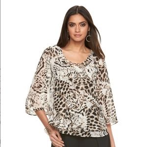 Jennifer Lopez lace-up blouse